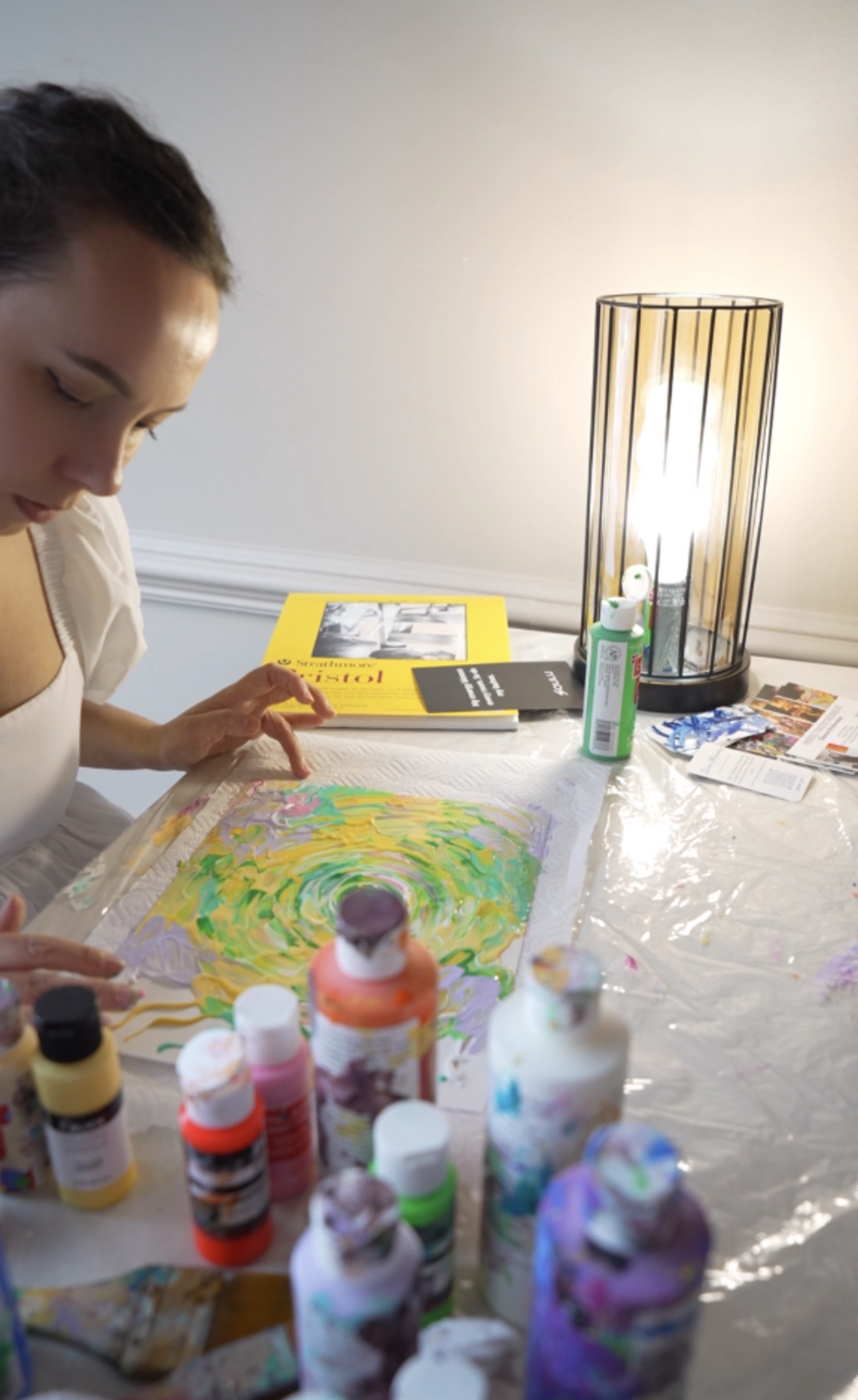 Zhanna painting a colorful abstract Soul Portrait